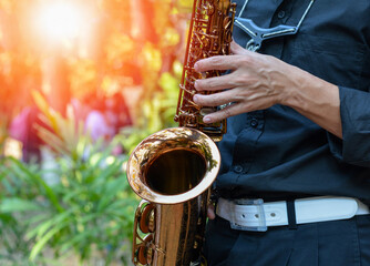 International jazz day and World Jazz festival. Saxophone, music instrument played by saxophonist player musician in fest.