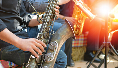 International jazz day and World Jazz festival. Saxophone, music instrument played by saxophonist player musician in fest.