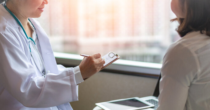 Women's Health healthcare concept. Obstetricians consulting female patient on Obstetrics and Gynecology diseases.Professional psychologist doctor consult in psychotherapy session or counsel diagnosis