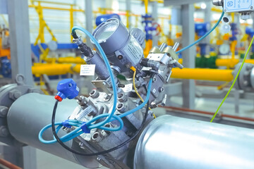 Valves and gas meters in gas metering room in the gas pipeline at the LNG plant