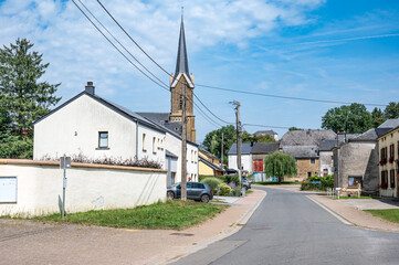 Residential houses and church tower of Saint Remy Virton, Belgium
