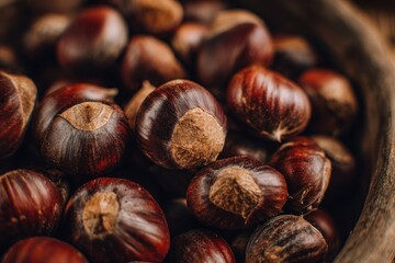 Obraz premium Top view of chestnuts in shell natural texture food.