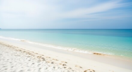 Fototapeta premium Blurred Tropical Beach Scene with Turquoise Water and White Sand