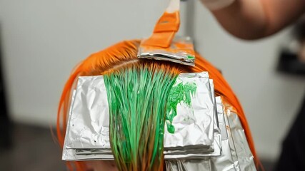 Applying vibrant green and orange hair dye - Powered by Adobe