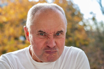 Angry Aggressive Stressed senior man, visual person experiencing intense frustration, Confrontation...