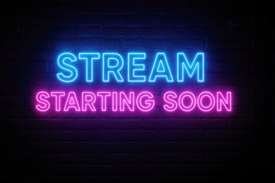 Glowing neon sign on a dark brick wall reading STREAM STARTINGS ON in blue and pink stream starting soon