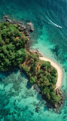 Stunning aerial view of a tropical island with turquoise water and lush green vegetation.