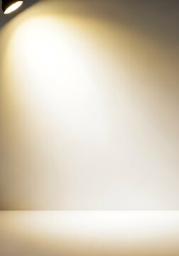 Studio spotlight on empty wall