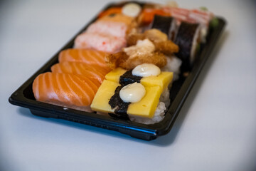 Assortment of Fresh Sushi and Salmon Sashimi Platter