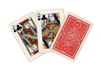 A hand of three vintage playing cards with two cards revealed on a white background.