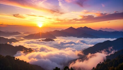 Obraz premium Layered mountains fade into the distance, with soft clouds and golden sunlight.