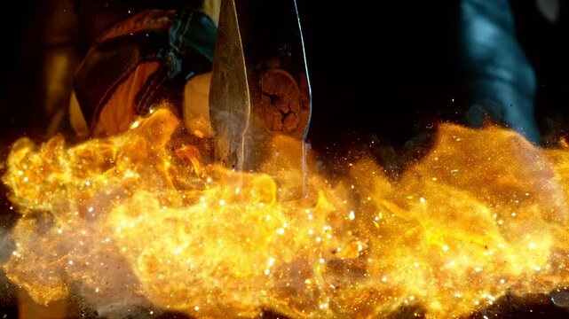 Cinematic close-up of blacksmith forging glowing hot iron on anvil with sparks flying. Shot in dramatic lighting on dark background with high-speed camera at 1000fps.