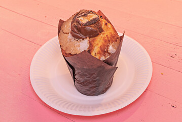 Delicious Homemade muffins topped with salted caramel and caramelized pecan frosting
