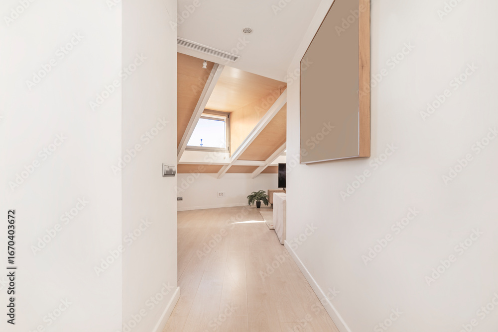 Aufkleber a hallway with white walls and where simplicity and natural light create visual purity.