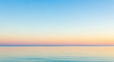 Obraz premium Serene Ocean Horizon at Sunrise with Pastel Sky
