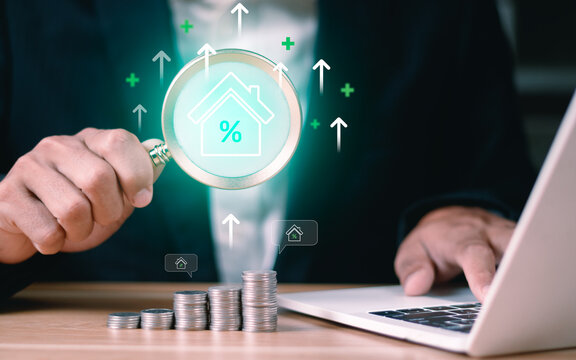 Interest rate and dividend concept. Businessman with percentage symbol and up arrow, Interest rates continue to increase, return on stocks and mutual funds, long term investment for retirement.