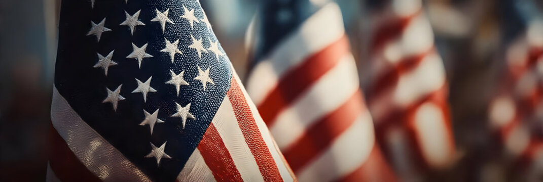 A close-up view of American flags waving gently, symbolizing patriotism, unity, and national pride. Perfect for commemorative events and celebrations.