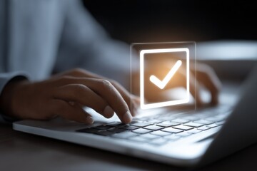 Business professional completes digital checklist using laptop, representing online task management and efficient workflow