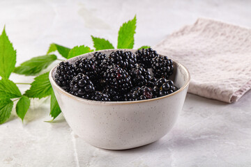 Raw sweet juicy blackberry in the bowl