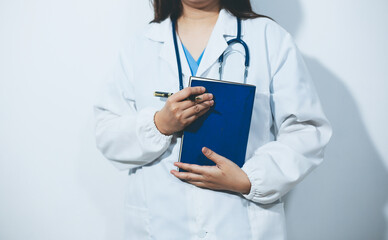 Portrait of female doctor, holding file