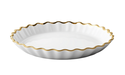 A white ceramic dish with a scalloped edge and gold trim, elegantly designed for serving food.