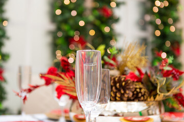 Champagne glass on Christmas decorated table