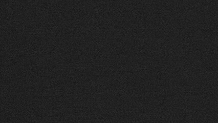 A solid black background with a noisy texture