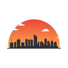 Obraz premium Silhouette cityscape against a gradient sunset with clouds orange
