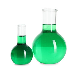 Flasks with green liquid isolated on white