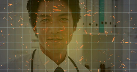 Standing doctor in labcoat in clinic, with stethoscope, outlets, grid overlay, orange particles