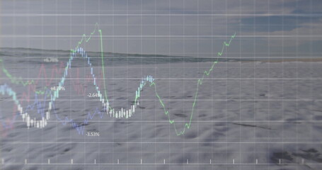 Displaying grid overlay with colored line and candlestick charts on beach shoreline, finance