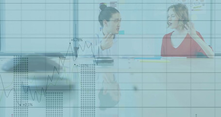 Discussing financial charts while colleagues analyzing data in conference room with glass-top table
