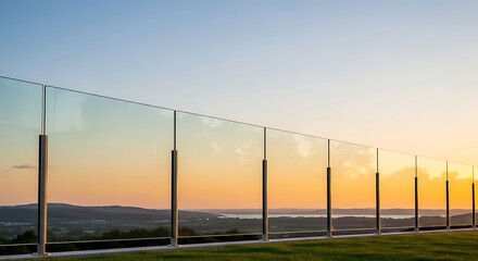 Fototapeta premium Glass Fence at Sunset Landscape.