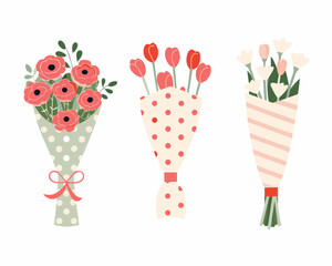 Three beautiful bouquets of flowers wrapped in decorative paper