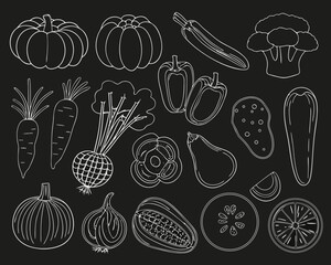 Collection of hand drawn vegetables and fruits on a black background