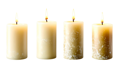 Pillar candles with flames illuminated, isolated on white background
