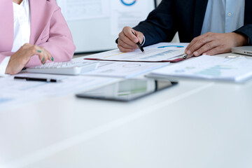 Adult Business Professionals Analyze Financial Data Discuss Reports Collaboration Meeting Office Setting Project Planning Strategy Development.