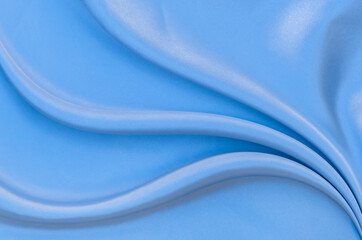 White gray satin texture that is white silver fabric silk background with beautiful soft blur pattern