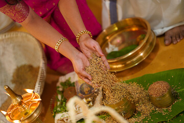Cultural Ceremony Featuring Grain Offering and Traditional Decorative Objects in Vibrant Setting