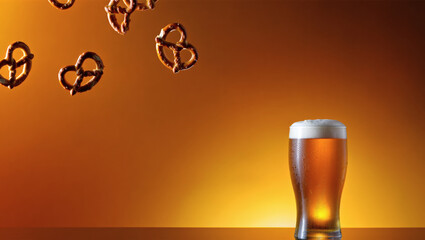 Fresh beer with pretzels on an orange background. Stylish image for projects related to beer production and sales, festive events, and food festivals.