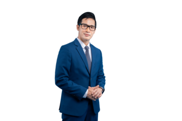Asian businessman in a stylish suit.  The man has eyeglasses and is in a formal pose with hands clasped on PNG background