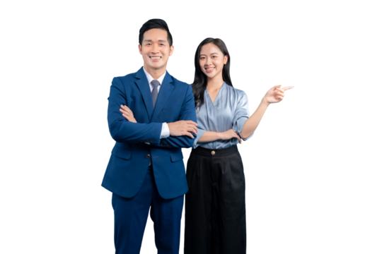 Asian business partners in formal attire posing and smiling at the camera.  The woman is pointing while the man is in a confident stance on PNG background