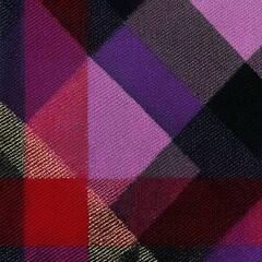 Colorful patchwork quilt with a purple and black design. The quilt is made up of squares of different colors