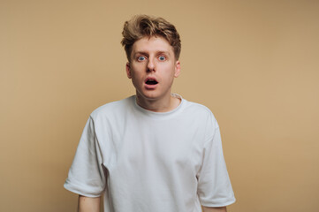 Expression of surprise captured in an indoor setting during daylight