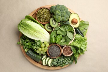 Superfood. Different healthy products on beige background, top view
