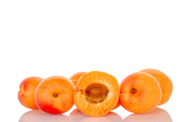 Ripe organic apricots isolated on white background, macro.