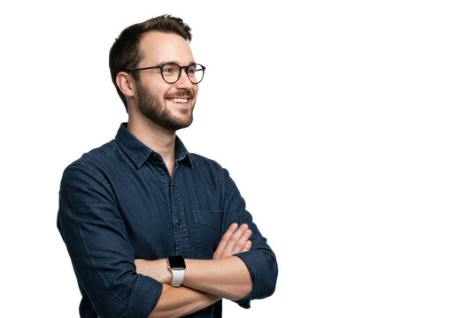 Young caucasian man (30s), dark hair, beard, glasses, denim, smartwatch, arms crossed, warm smile, on transparent studio background with copy space for a corporate professional optimistic portrait.