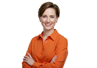 Young caucasian woman with brown bob, vibrant orange shirt, arms crossed, smiling confidently on transparent studio background, copy space, concept of professional expertise