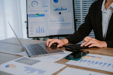 Deduction planning, debt asian young woman hand using calculator to calculating money balance from...