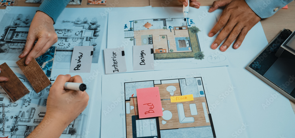 Poster Dynamic scene showcasing multiple hands working together on interior design plans, featuring colorful notes and samples, perfect for illustrating creative collaboration. SACTR
